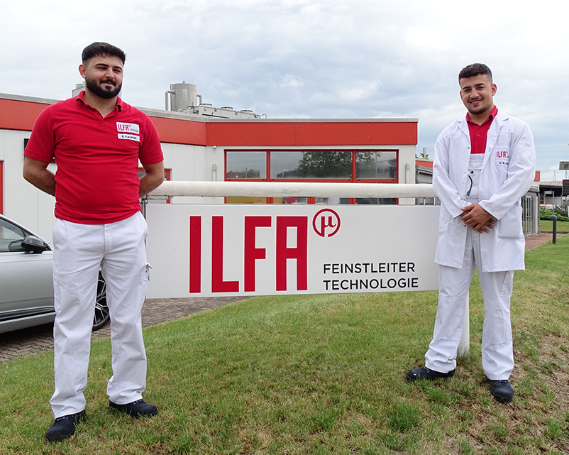 two young men finished apprenticeship at ILFA