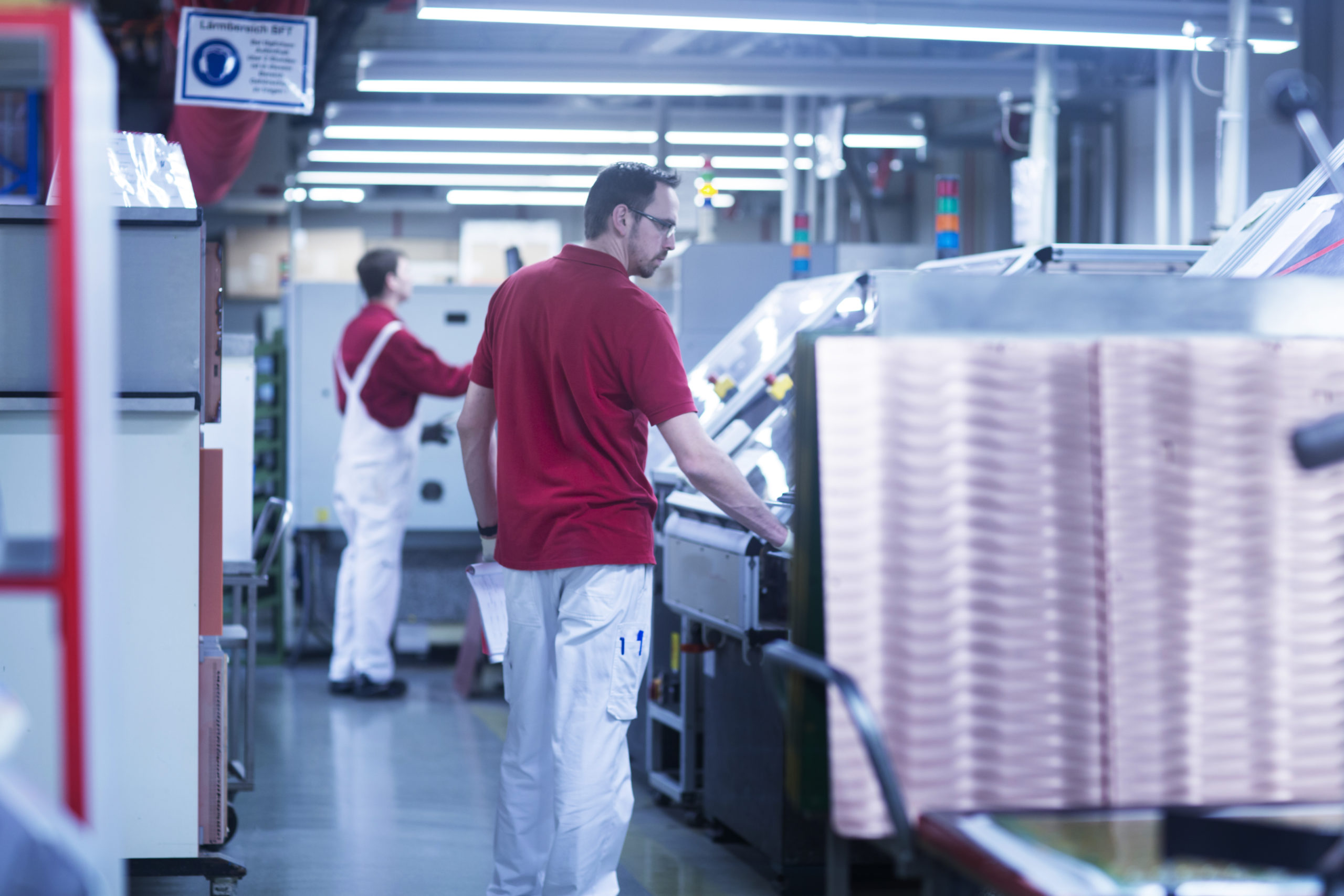 2 workers at ILFA PCB production