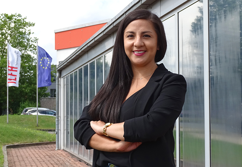 Liseth Villacres, purchasing manager, in front of ILFA headquarters